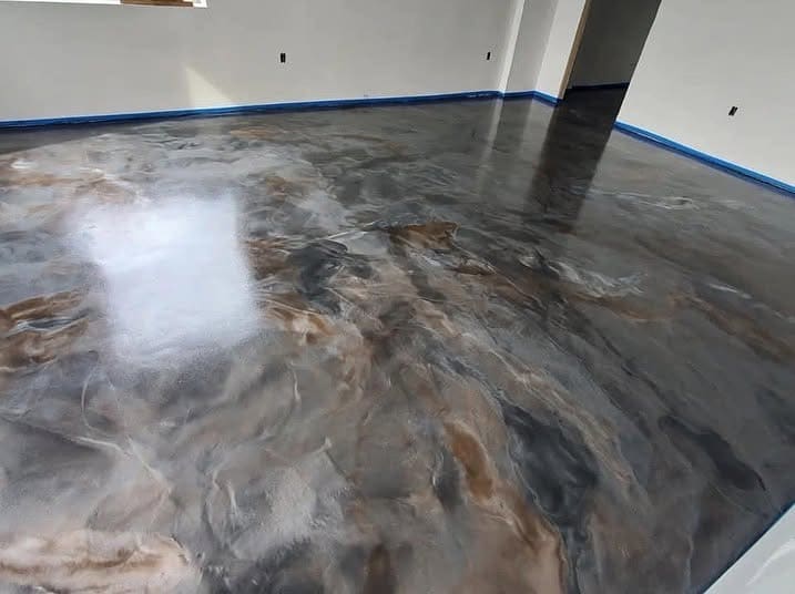 Room finished with a warm bronze and grey metallic epoxy floor