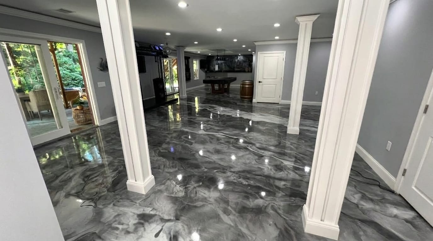 The same basement after: a high-gloss silver metallic marble epoxy floor